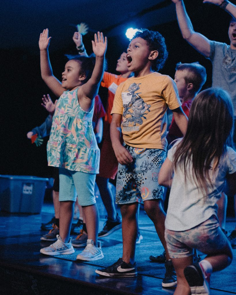 Kids on stage in worship at Church of the Valley in Chicopee, Pioneer Valley MA