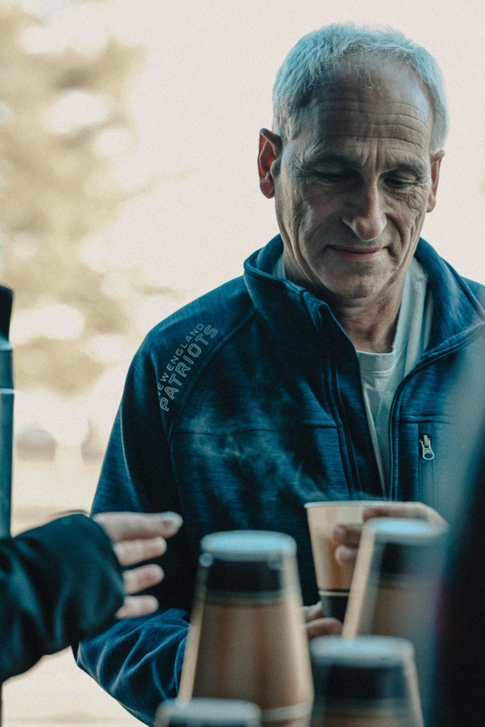 Man grabbing coffee at Church of the Valley in Chicopee, MA