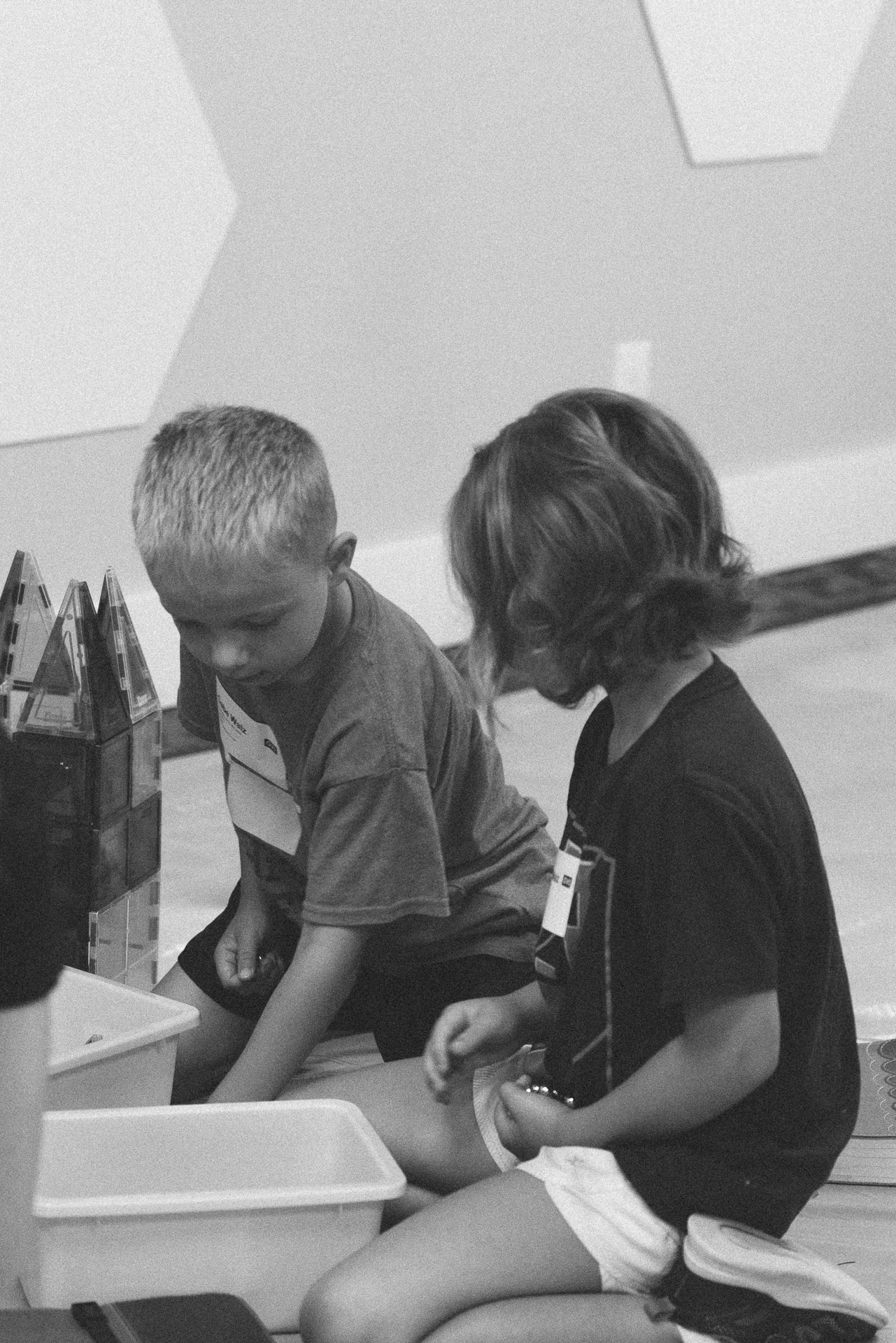 Two boys working on building a tower with toys at Church of the Valley in Chicopee, Pioneer Valley MA