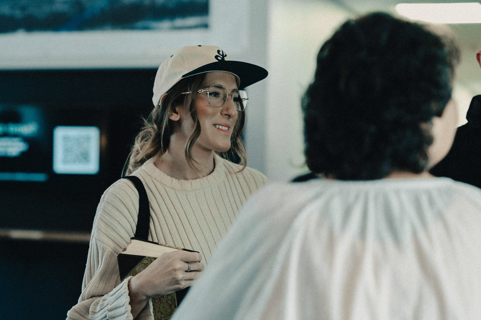 Woman holding bible in the Pioneer Valley